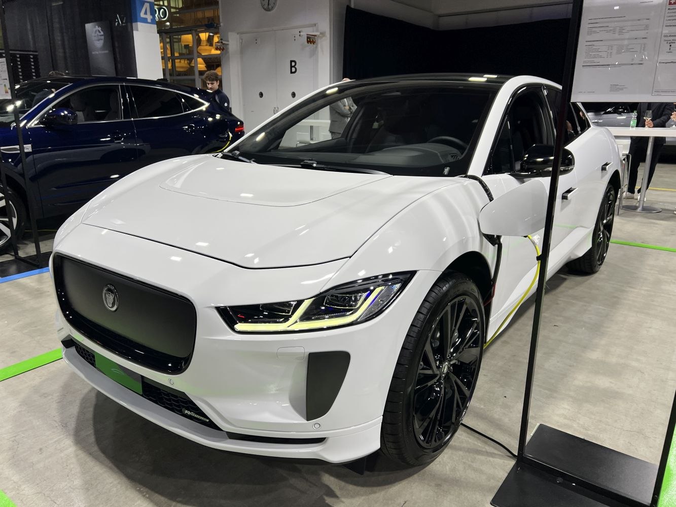 Electric SUV with sharp LED headlights and glossy black wheels