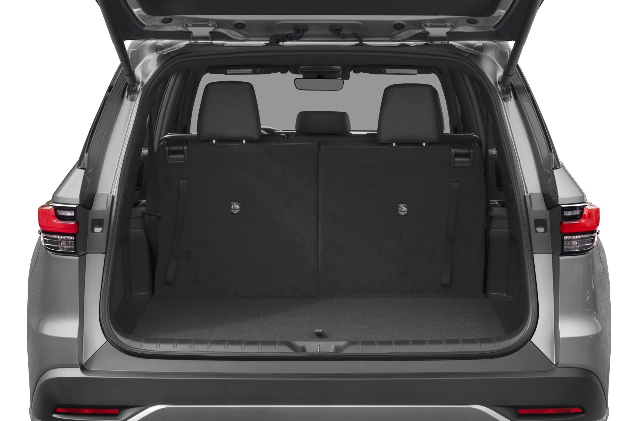 Spacious rear cargo area with foldable seats and open rear hatch