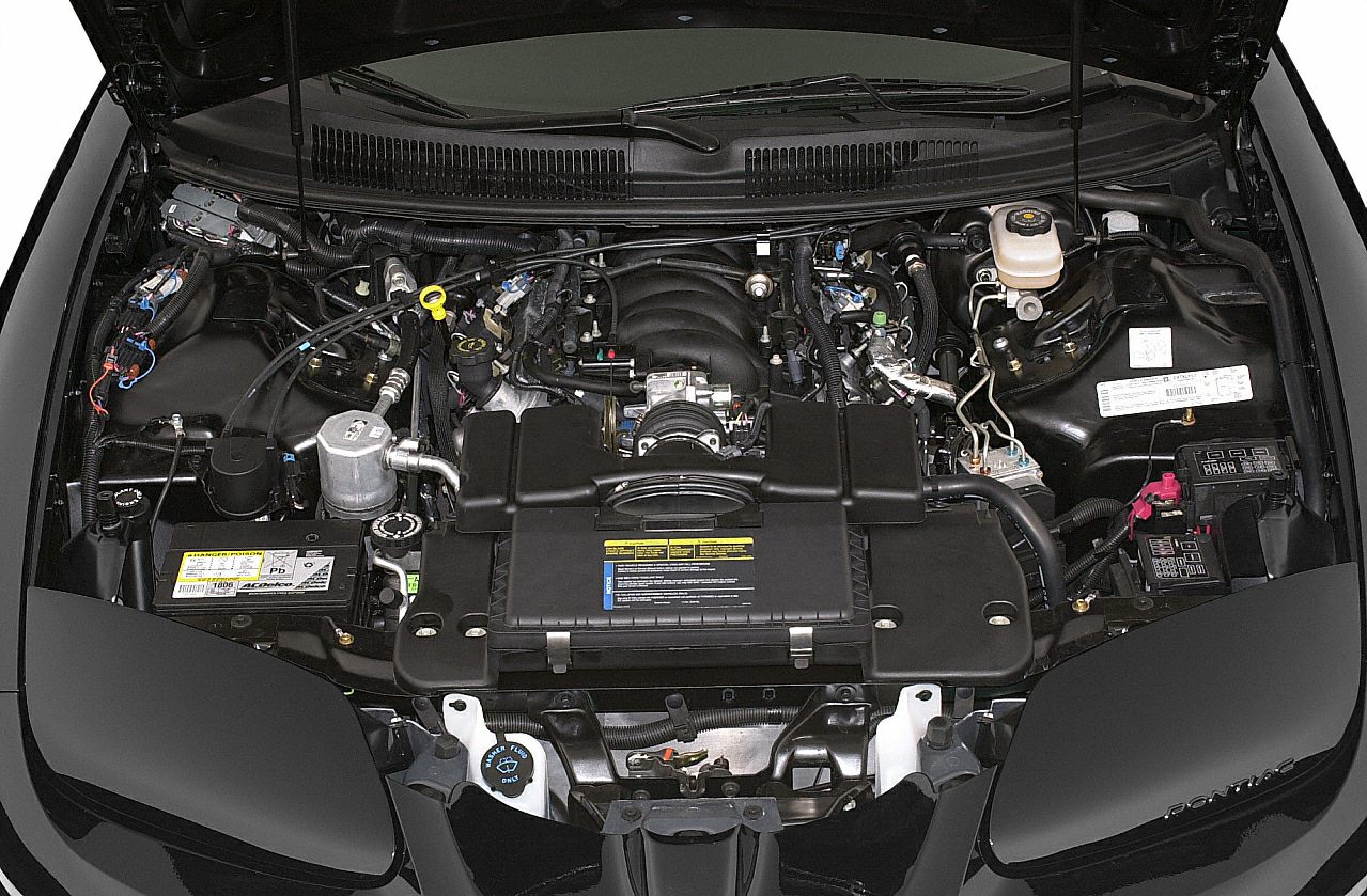 Engine bay showing detailed mechanical components and layout.