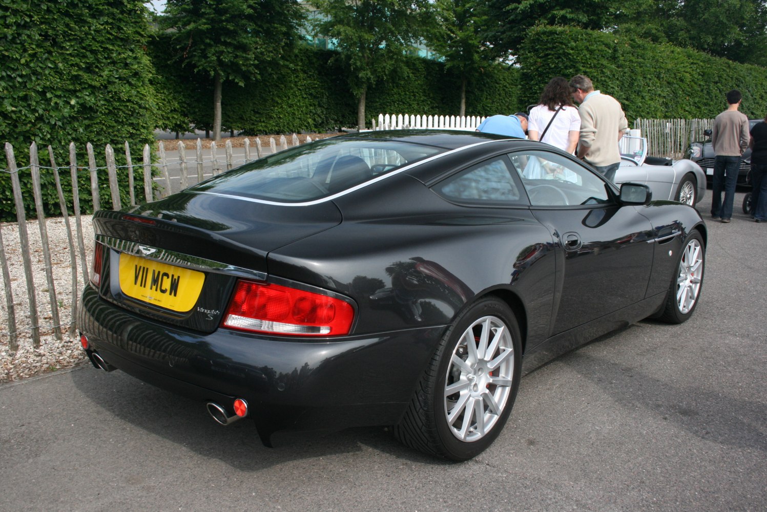 Rear view of luxury sports coupe with alloy wheels and dual exhaust