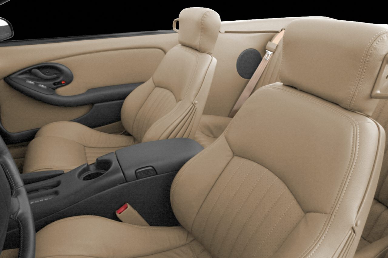 Beige leather seats and detailed door panel interior