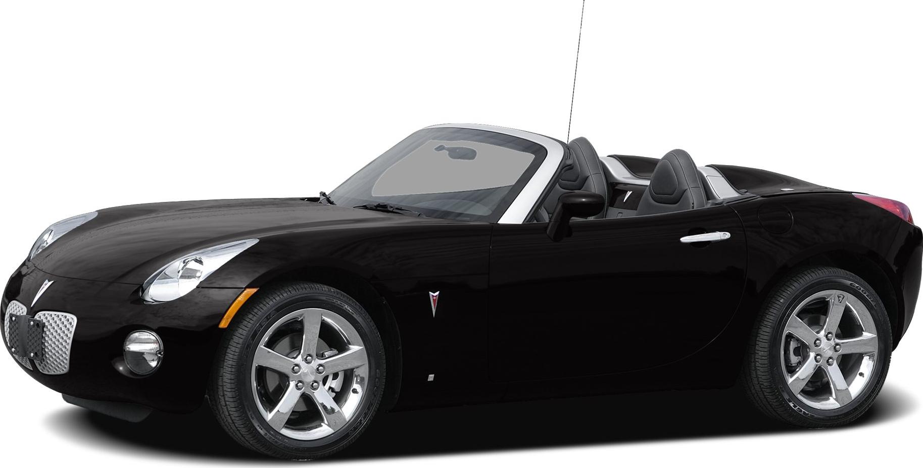 Convertible roadster with chrome 5-spoke wheels and aerodynamic styling