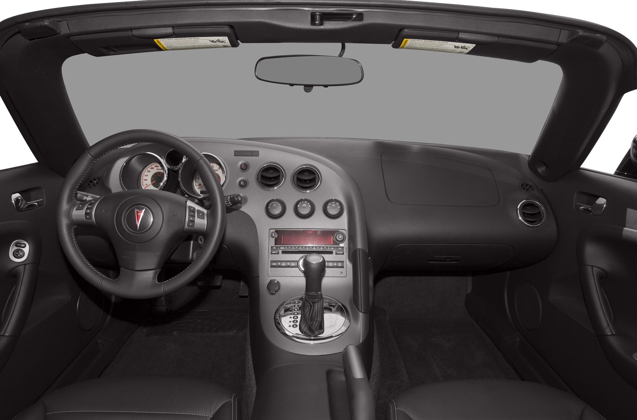 Interior dashboard, steering wheel, and center console layout