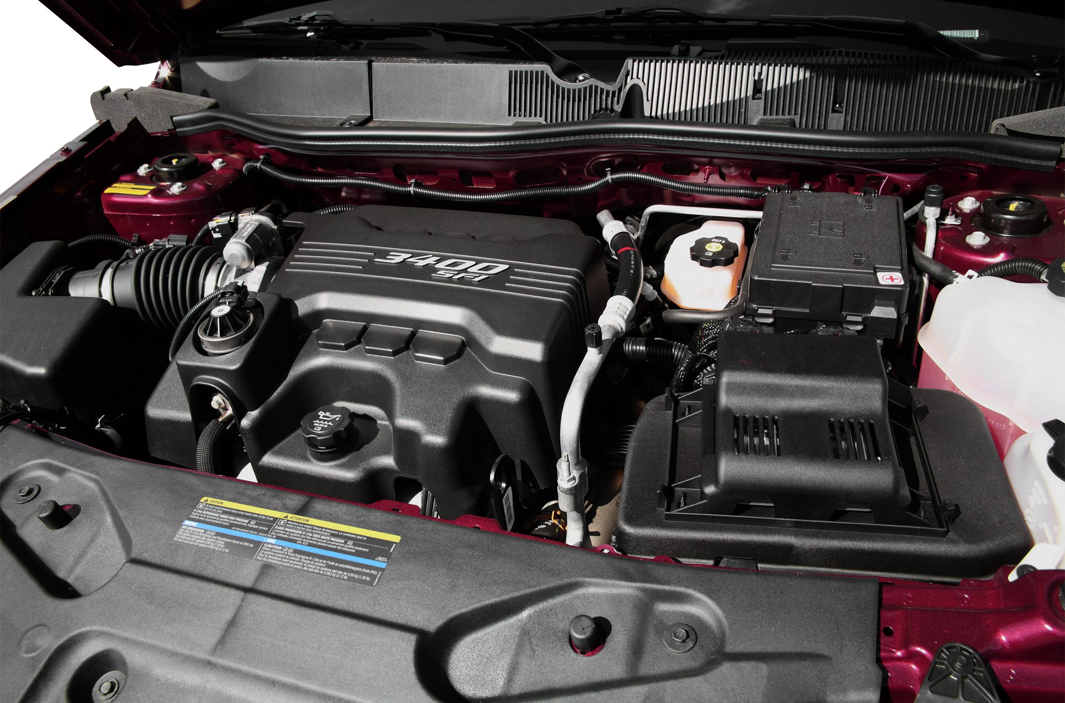 3400 SFI engine and detailed engine bay components under hood
