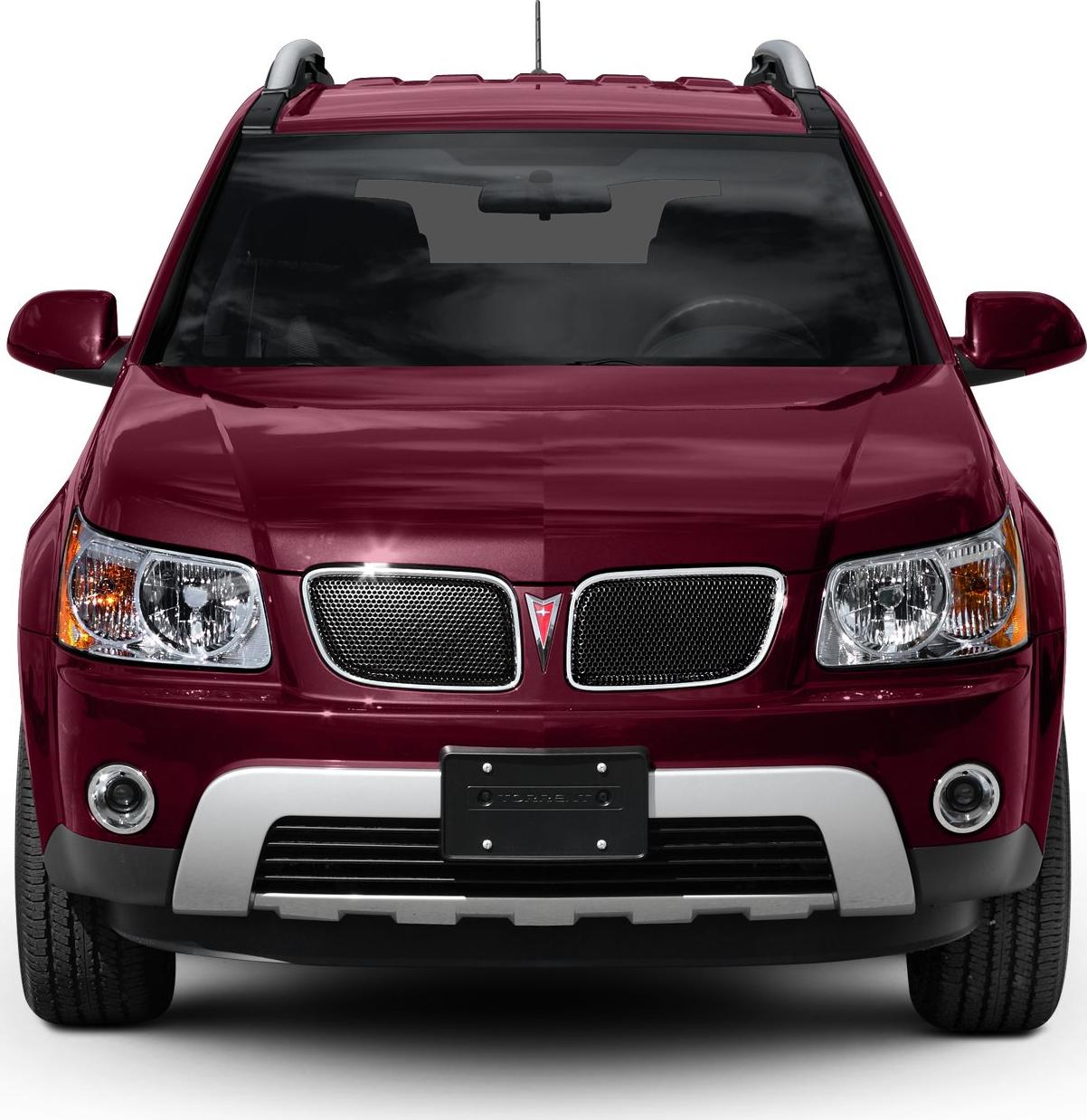 Front view with mesh grille, dual headlights, fog lights, and robust lower bumper.