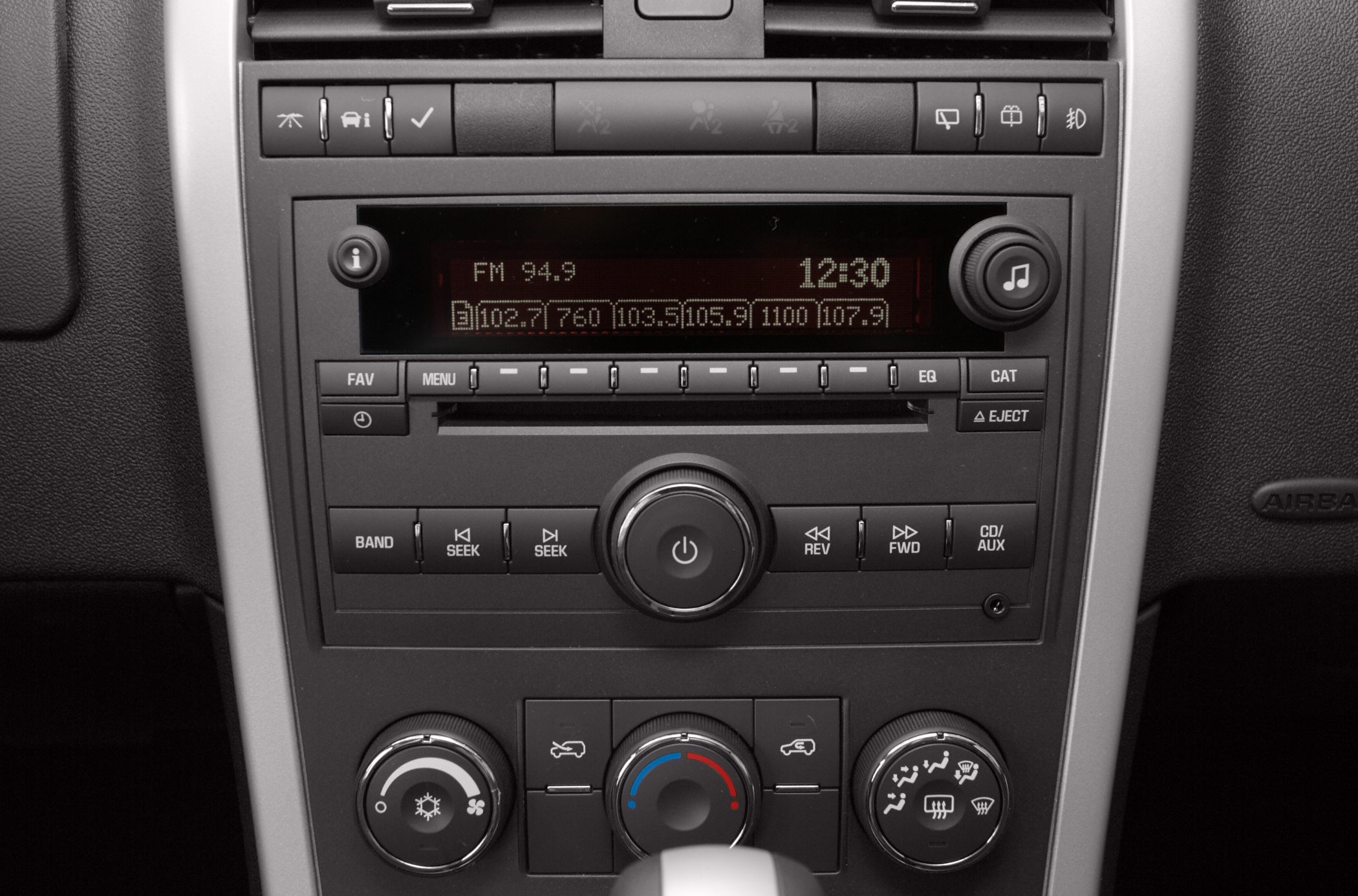Car dashboard radio and climate control knobs and buttons