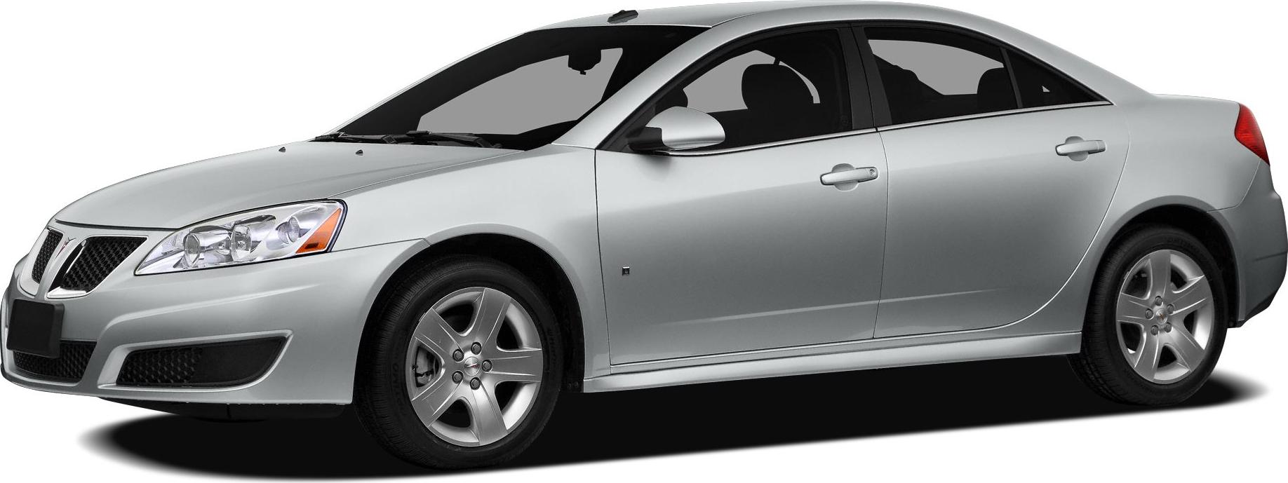 Silver sedan showing front-side profile with headlights and alloy wheels.