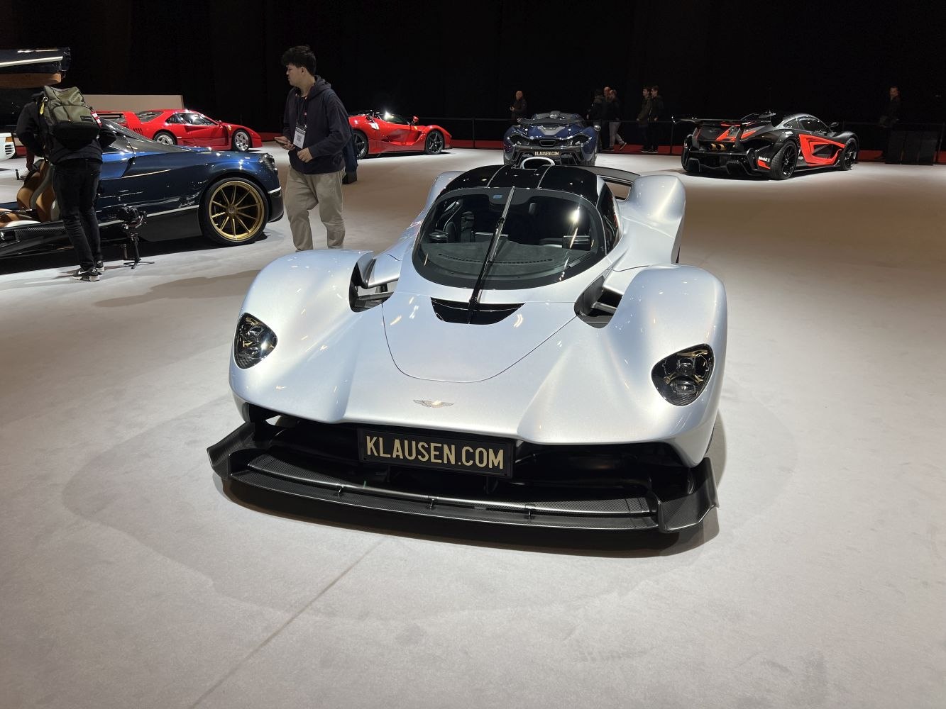 Sleek front view of a high-performance hypercar with aerodynamic design.