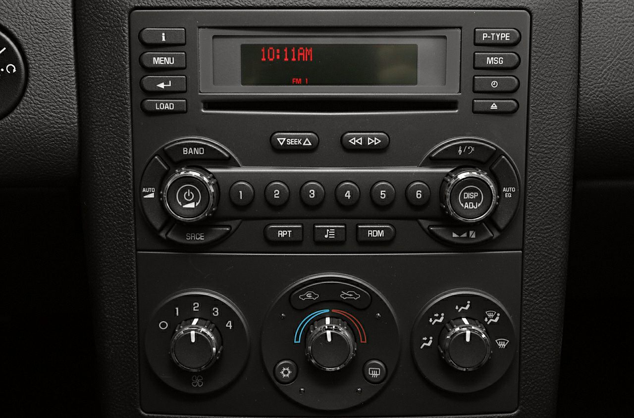 Car stereo system with climate control knobs and buttons