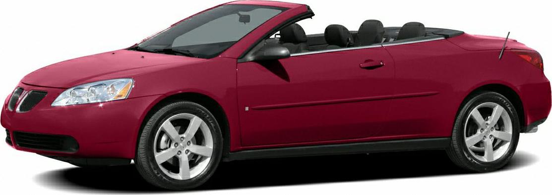 Red two-door convertible with soft top and alloy wheels side view