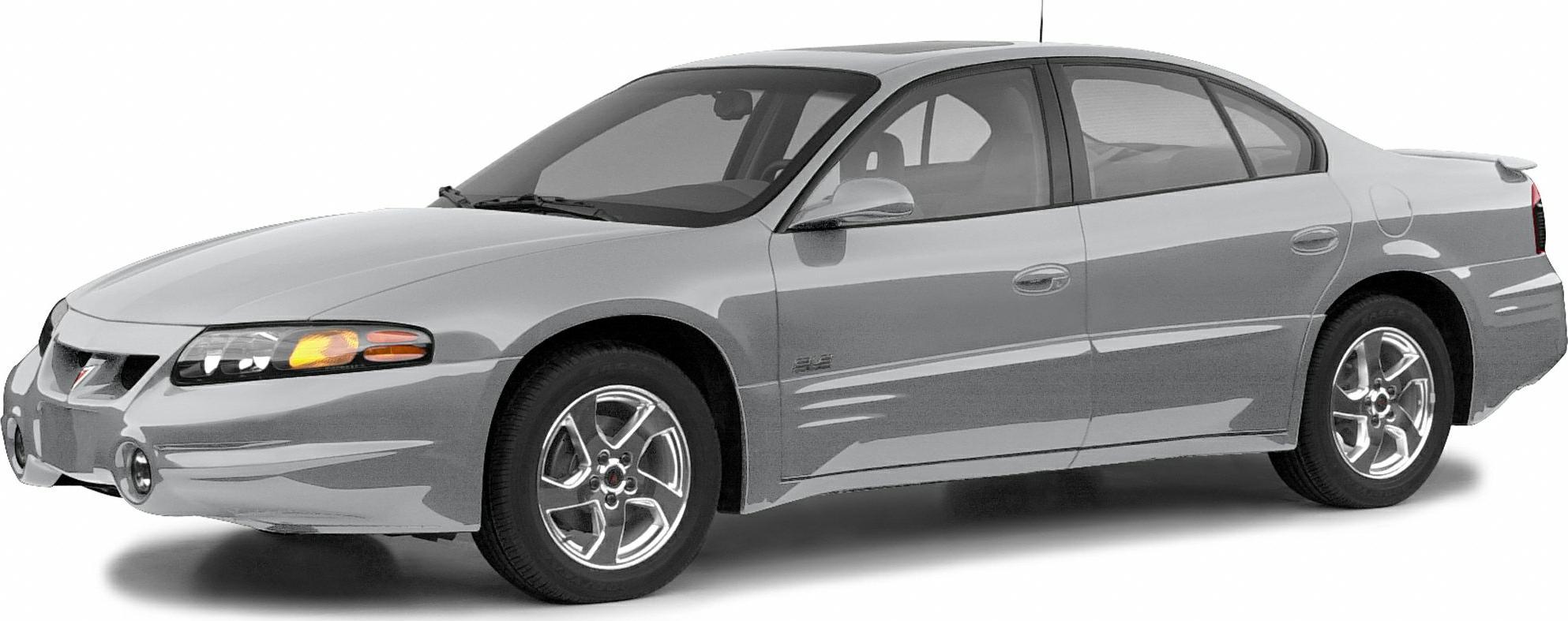 Side view of sedan with alloy wheels and fog lights