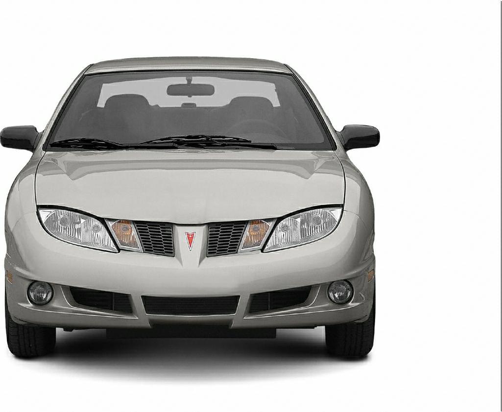 Front view showing headlights, grille, and fog lights of a coupe.