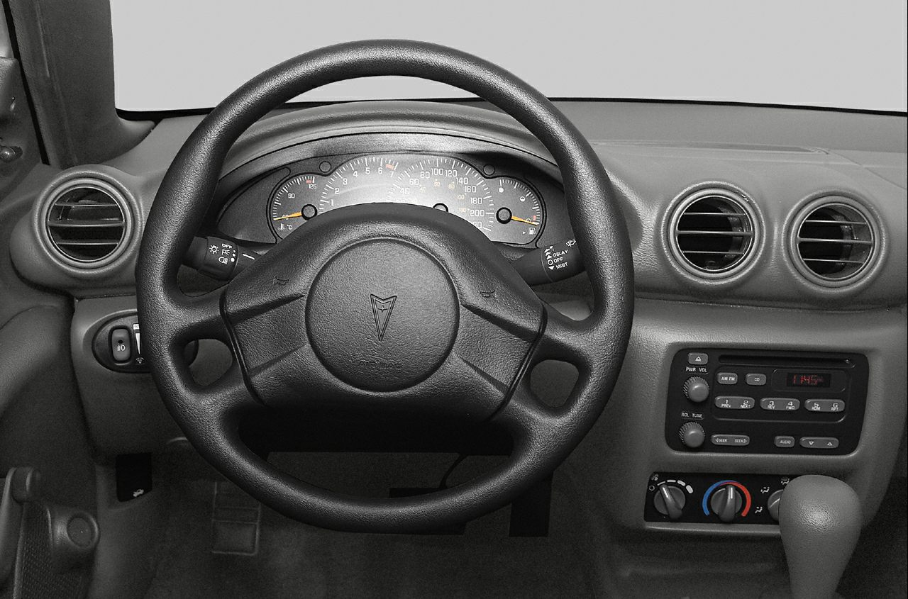 Steering wheel, dashboard gauges, ventilation controls