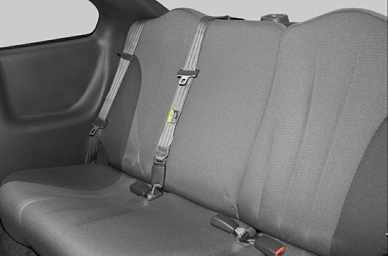 Rear fabric upholstery and seatbelt arrangement