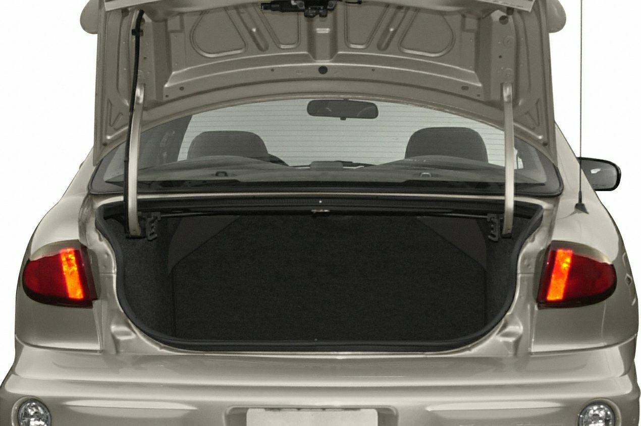 Open trunk and rear taillights view of a sedan