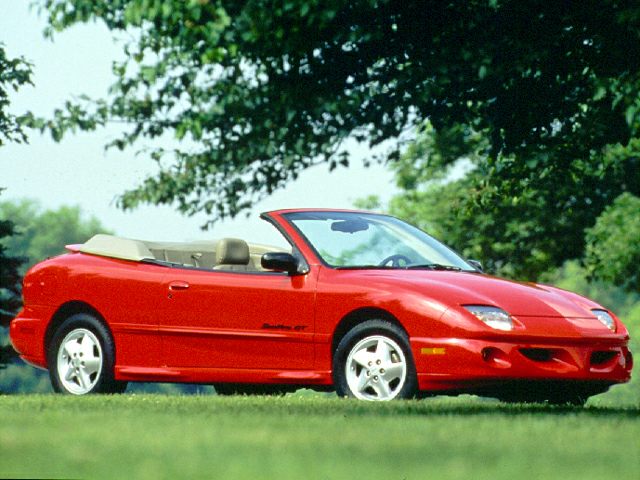 Red convertible with sporty two-door design and beige interior