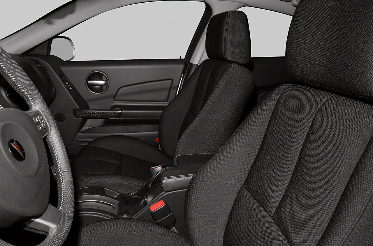 Front black cloth seats and door panel with round handle