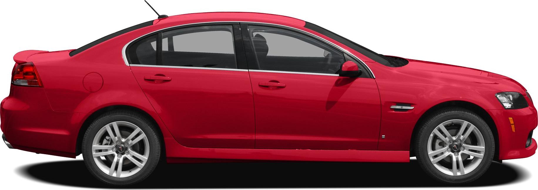 Side profile of a sedan with alloy wheels and rear spoiler