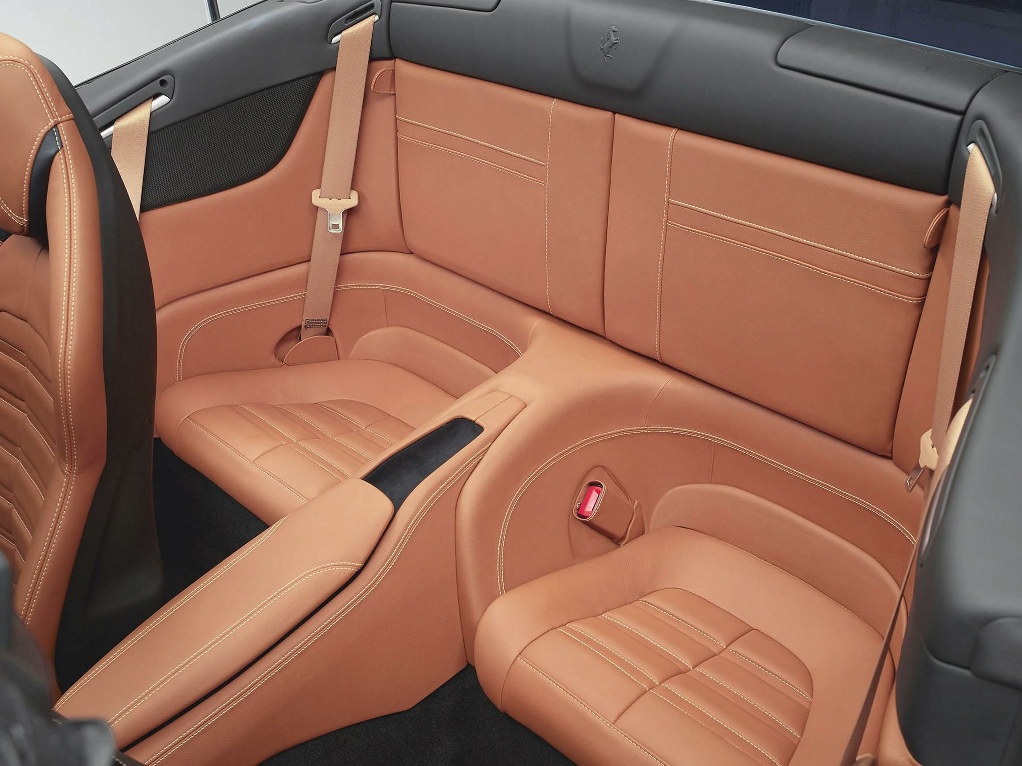 Leather rear seats with detailed stitching and seat belts