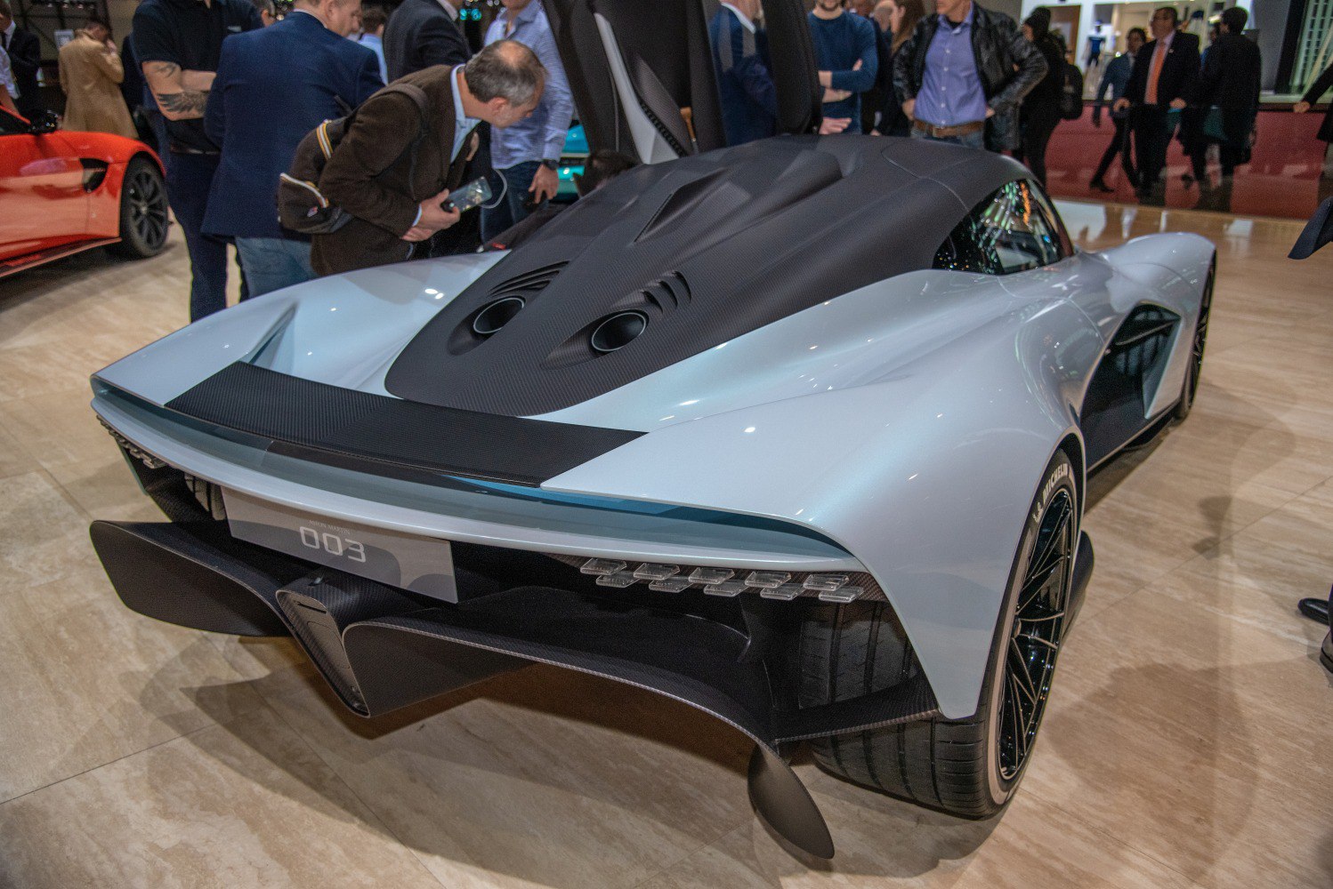 Aerodynamic rear view with carbon fiber accents and exhaust ports