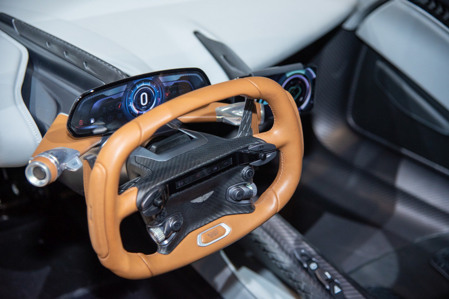 Steering wheel with digital dashboard and leather-carbon fiber mix