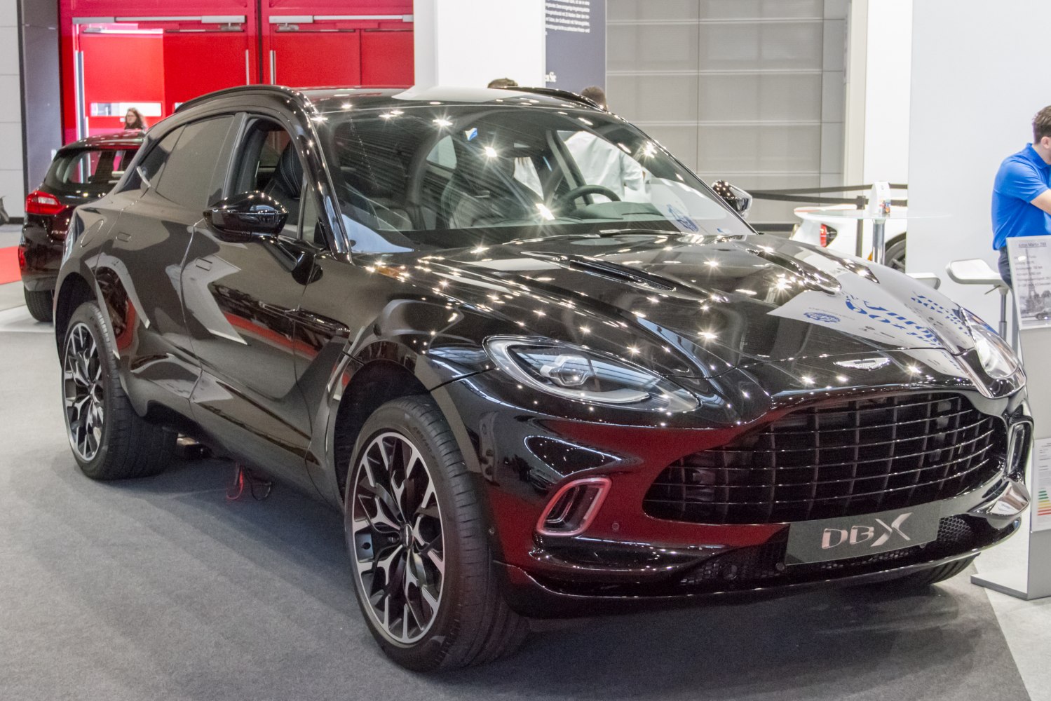 Luxury SUV front grille with sharp LED headlights and detailed alloy wheels