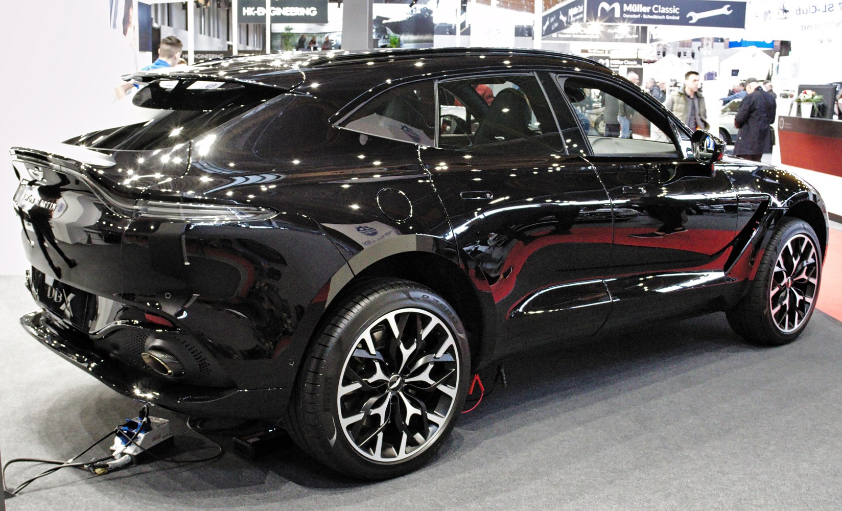 Sleek black SUV with aerodynamic rear and alloy wheels