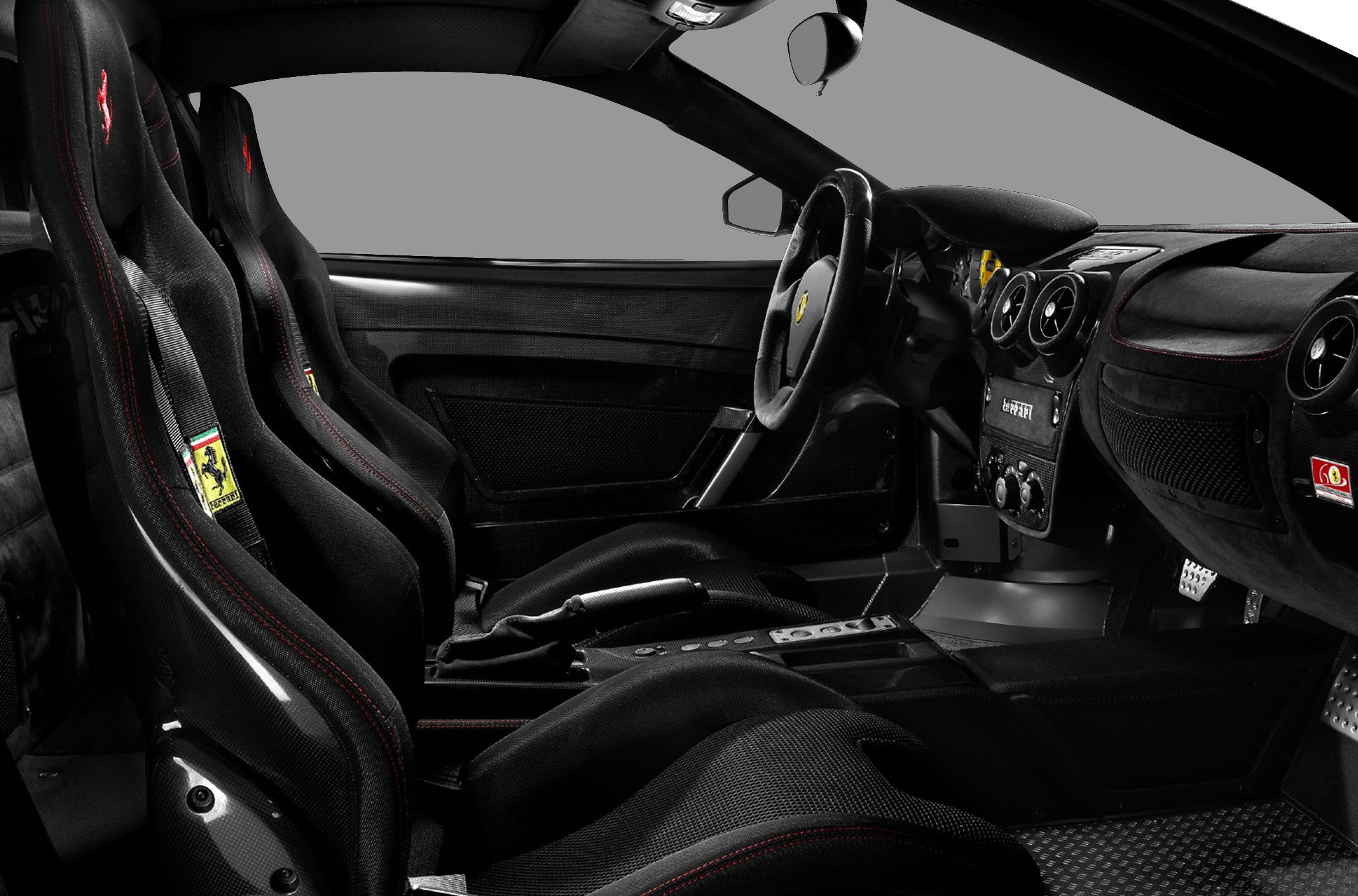 Carbon fiber racing seats and driver-centric cockpit of sports car interior