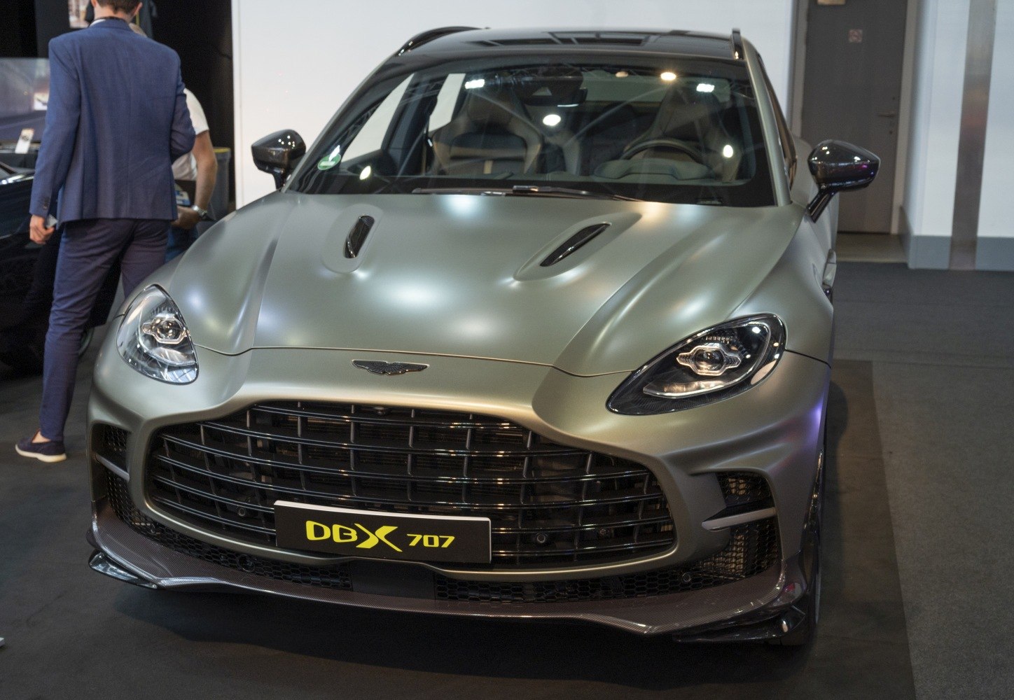 Front view with bold grille and ventilated hood vents