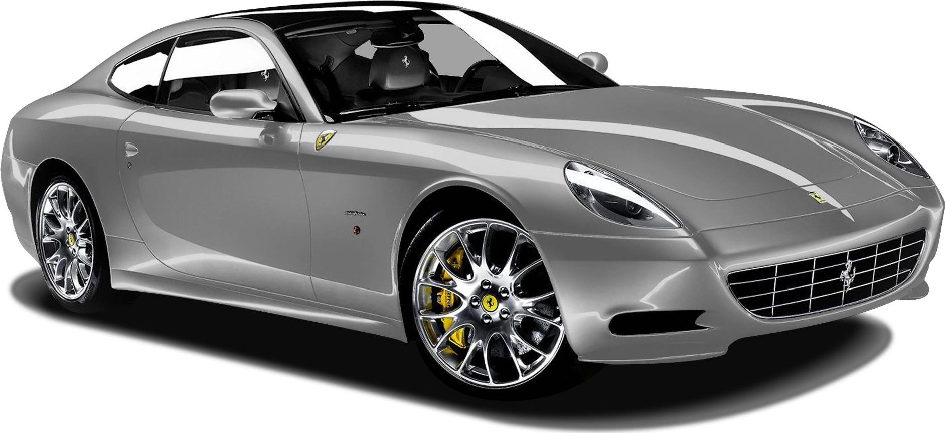 Front 3-4 view of a luxury coupe with chrome wheels and distinctive headlights