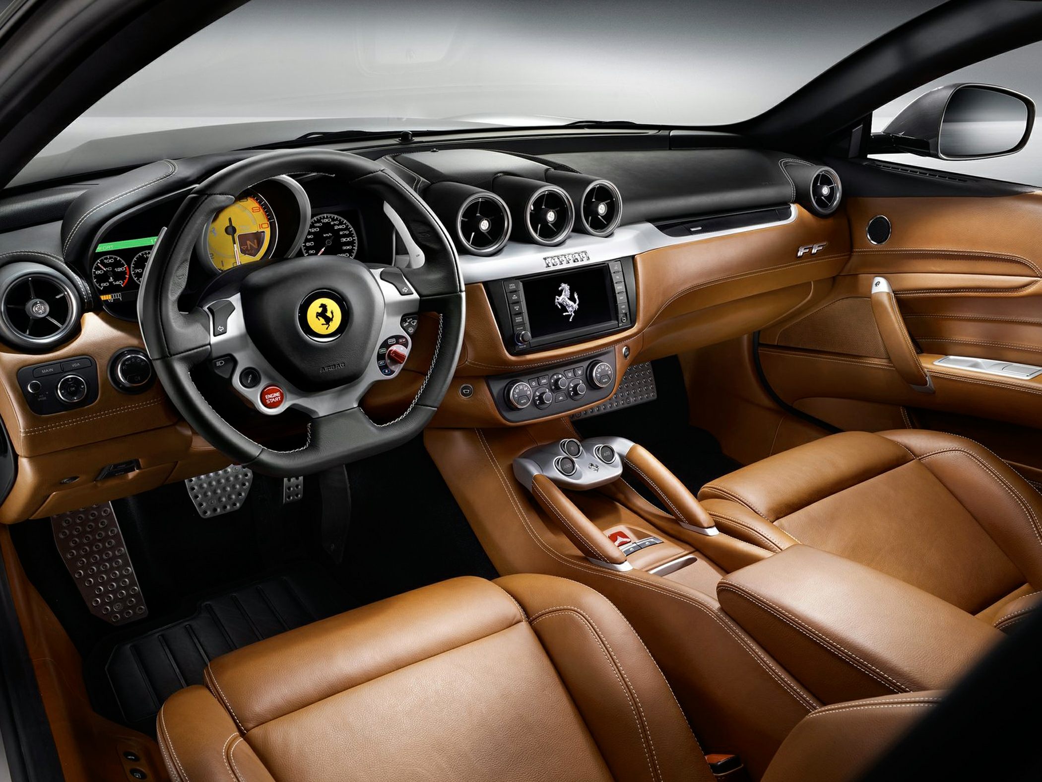 Luxury brown leather interior with sporty dashboard and steering wheel