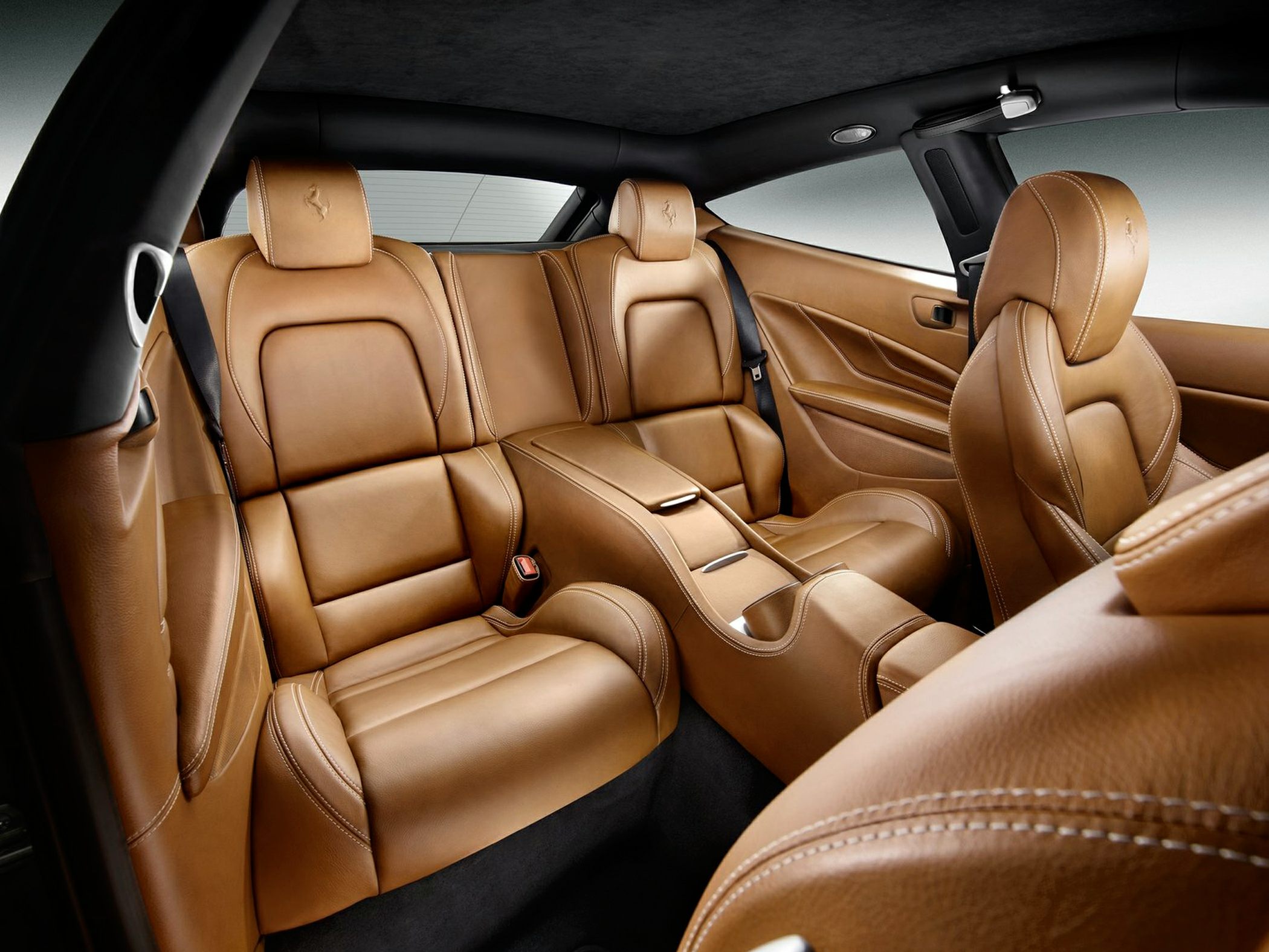 Tan leather rear seats with center armrest console