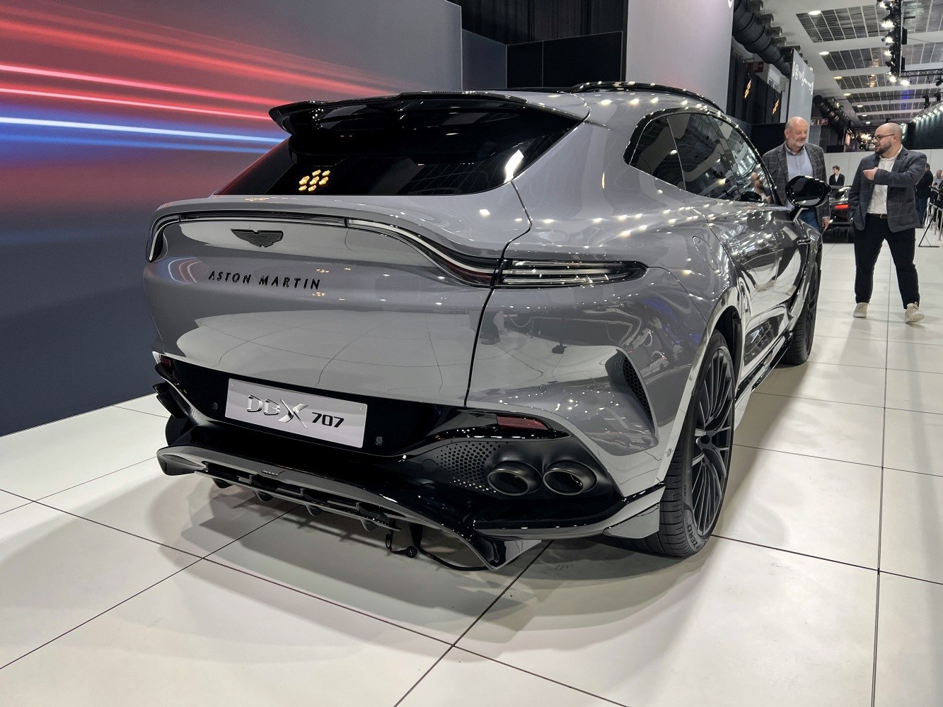 Rear view with quad exhaust, roof spoiler, sleek taillights