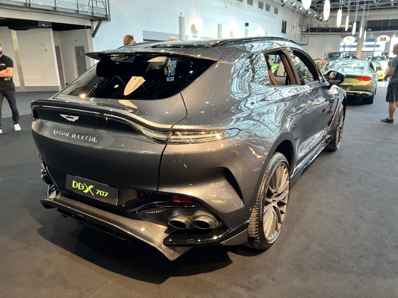 Sleek SUV rear with quad exhausts and integrated spoiler