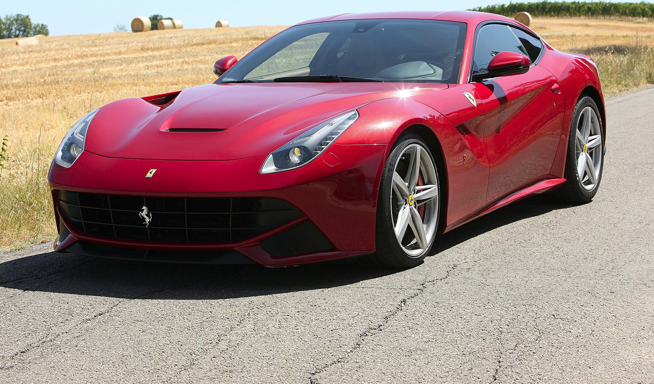 Red Ferrari F12tdf front with LED headlights and aggressive grille
