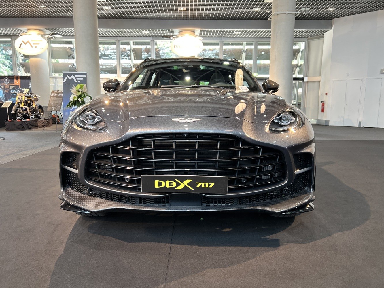 Prominent front grille and LED headlights of luxury SUV.