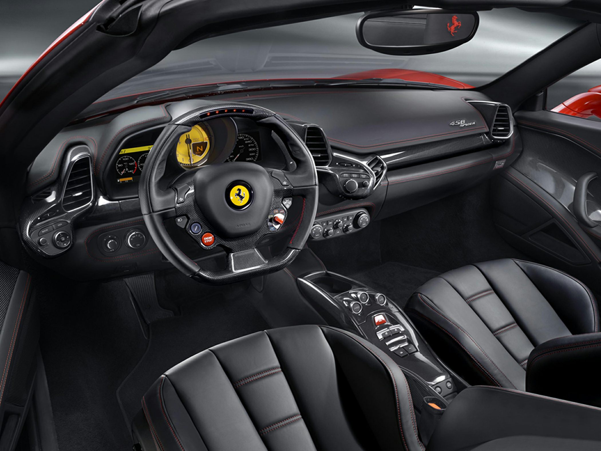 Sports car interior with detailed steering wheel and dashboard