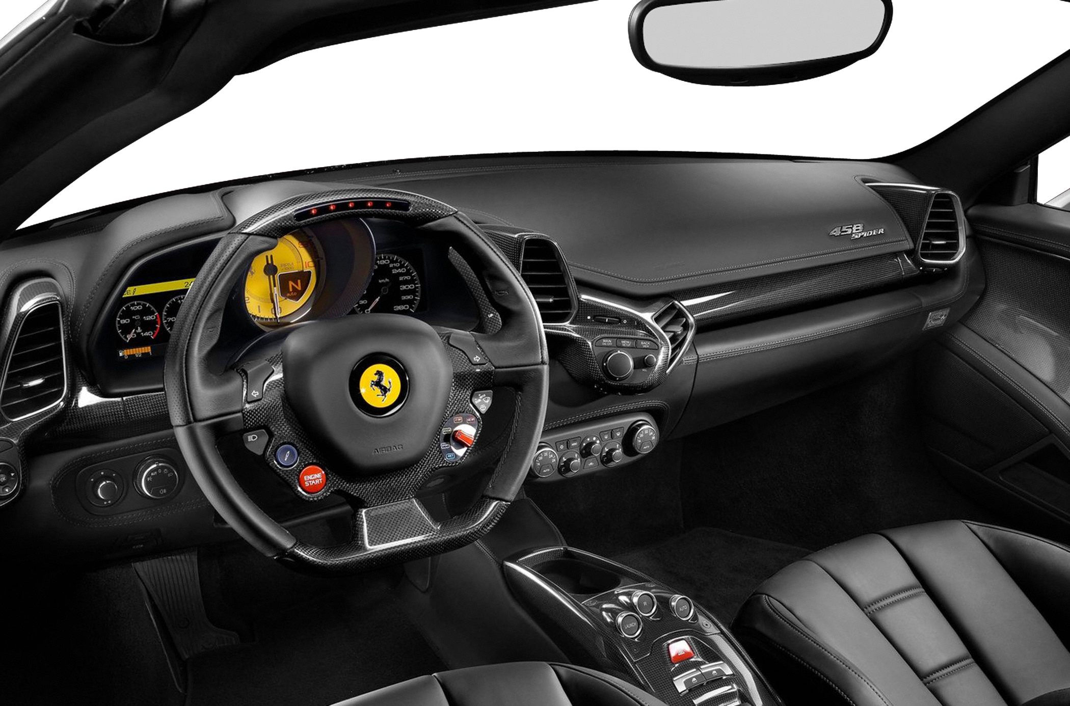 Carbon fiber steering wheel and advanced dashboard with multiple controls.