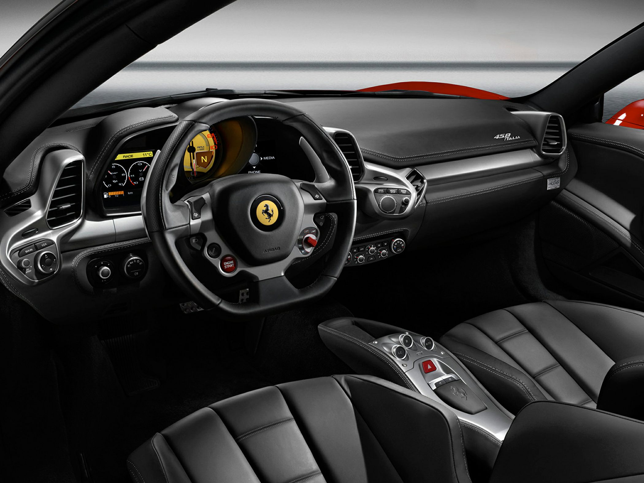 Sporty steering wheel and advanced dashboard in luxury car interior