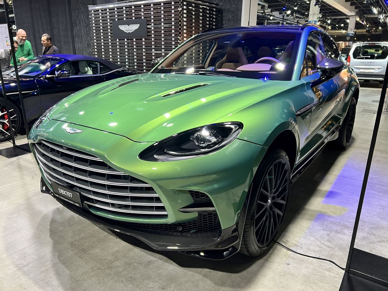 Front view of SUV with sleek headlamp and large grille