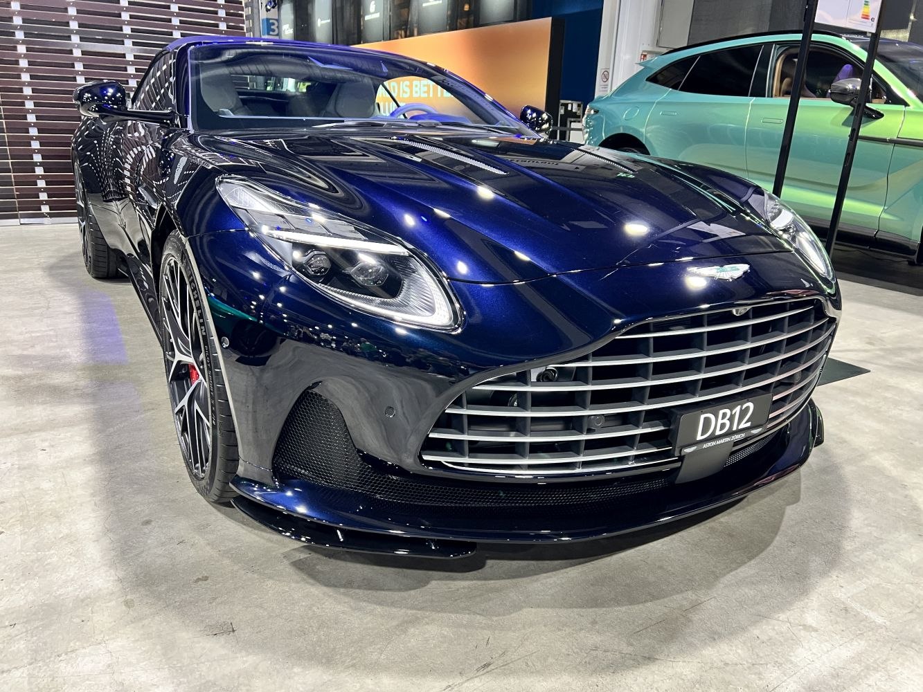 Front grille and headlight design of a luxury sports car.