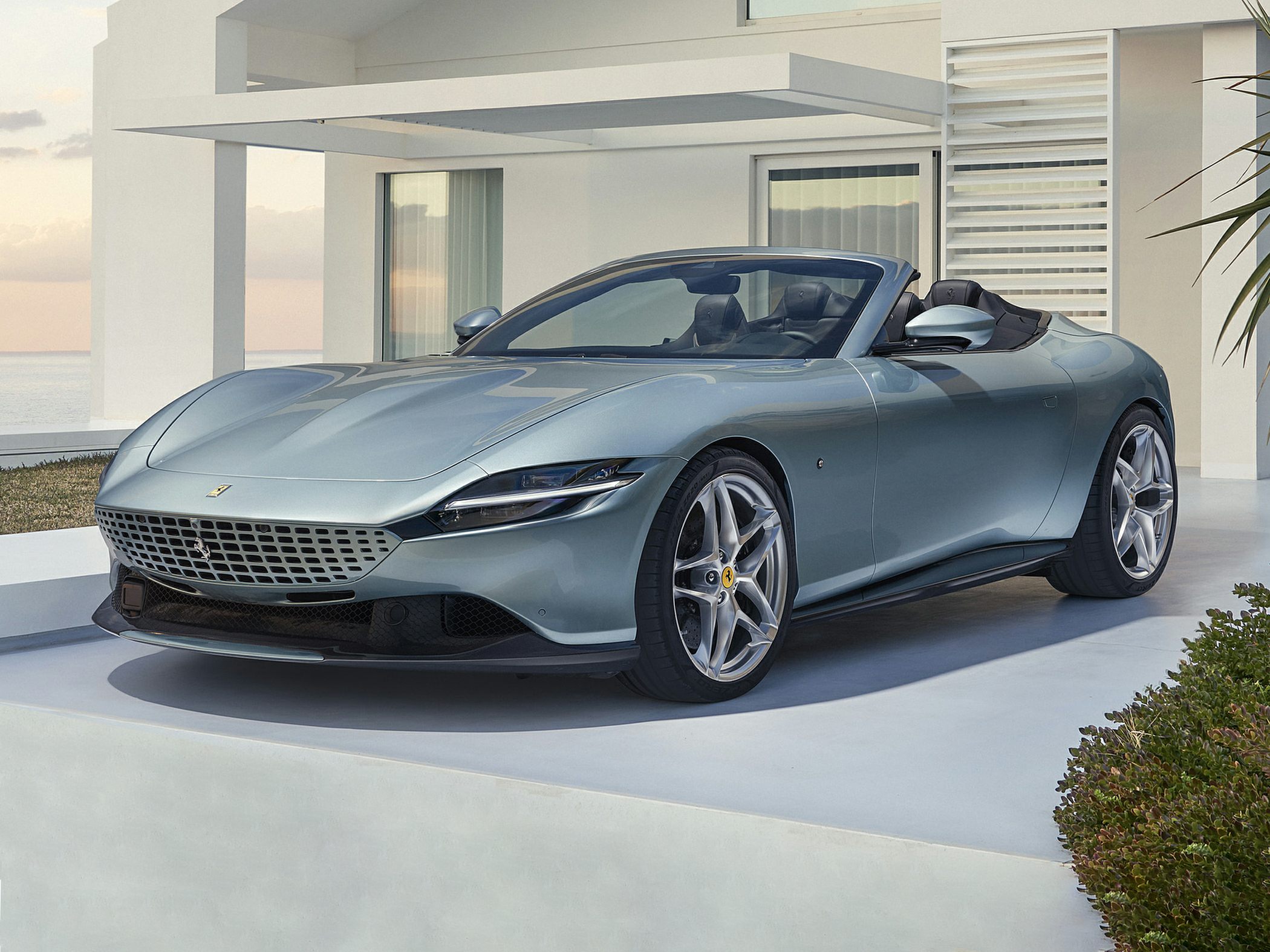 Convertible with sleek front grille and sporty alloy wheels