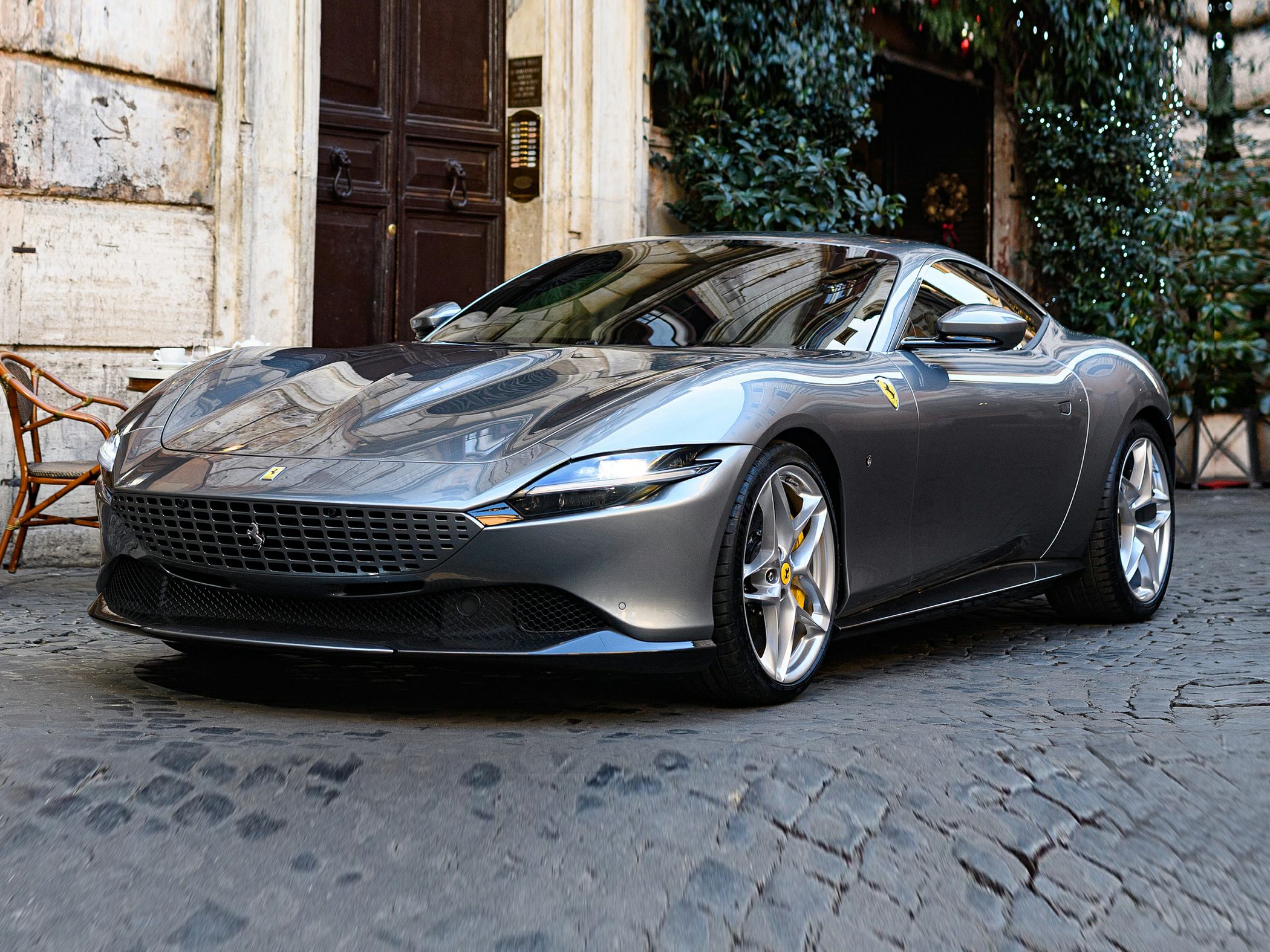 Distinctive front grille and sharp LED headlights of a sleek sports coupe