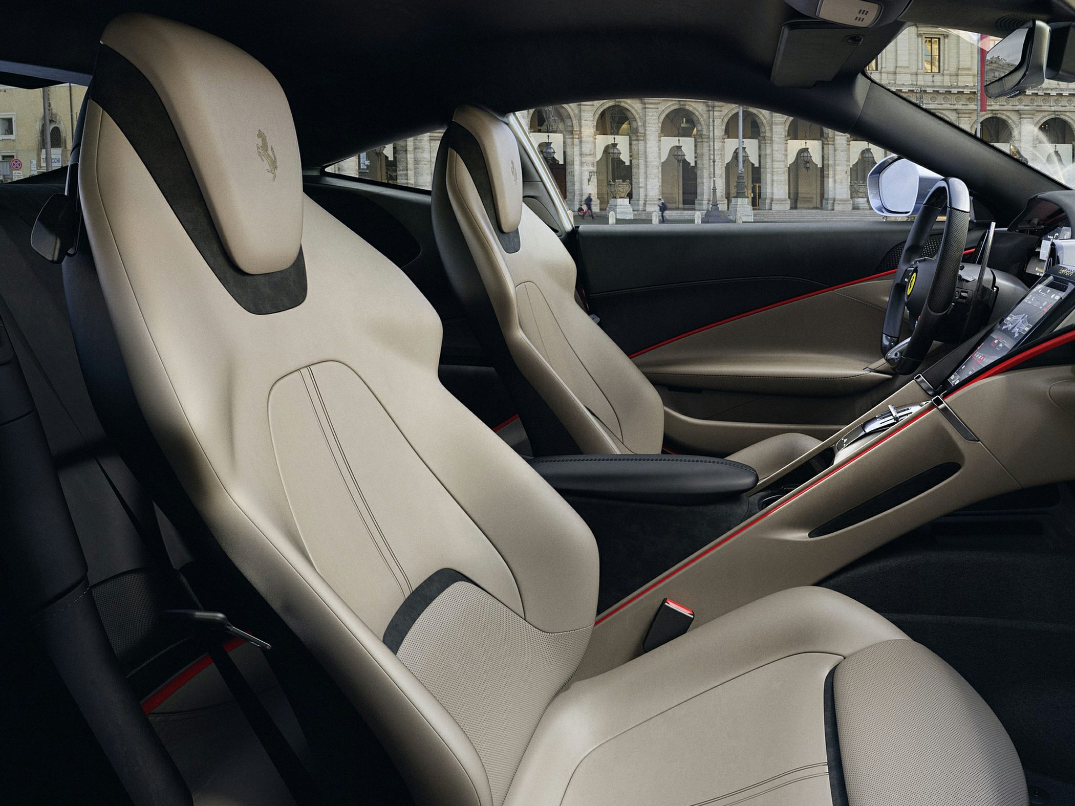 Luxury leather seats and sleek modern dashboard with red accents