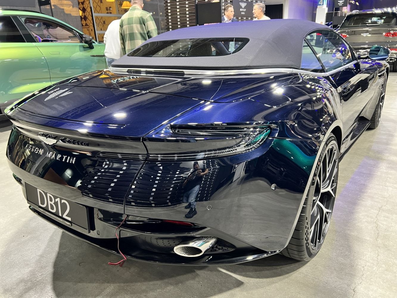 Rear view of luxury convertible with soft top and sleek taillights