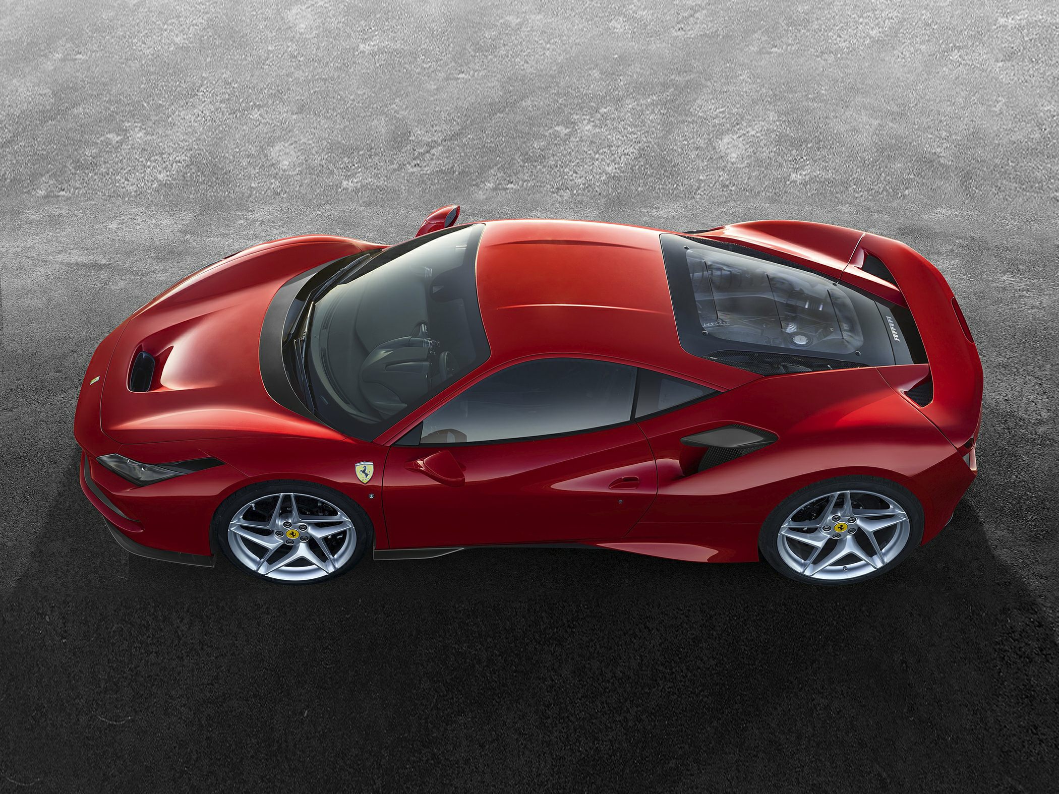Top view of sports car showing mid-engine and aerodynamic design