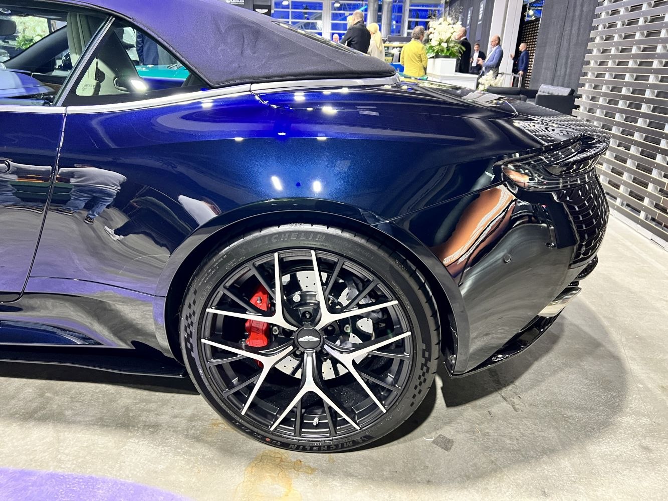 Rear wheel and red brake caliper with soft convertible top