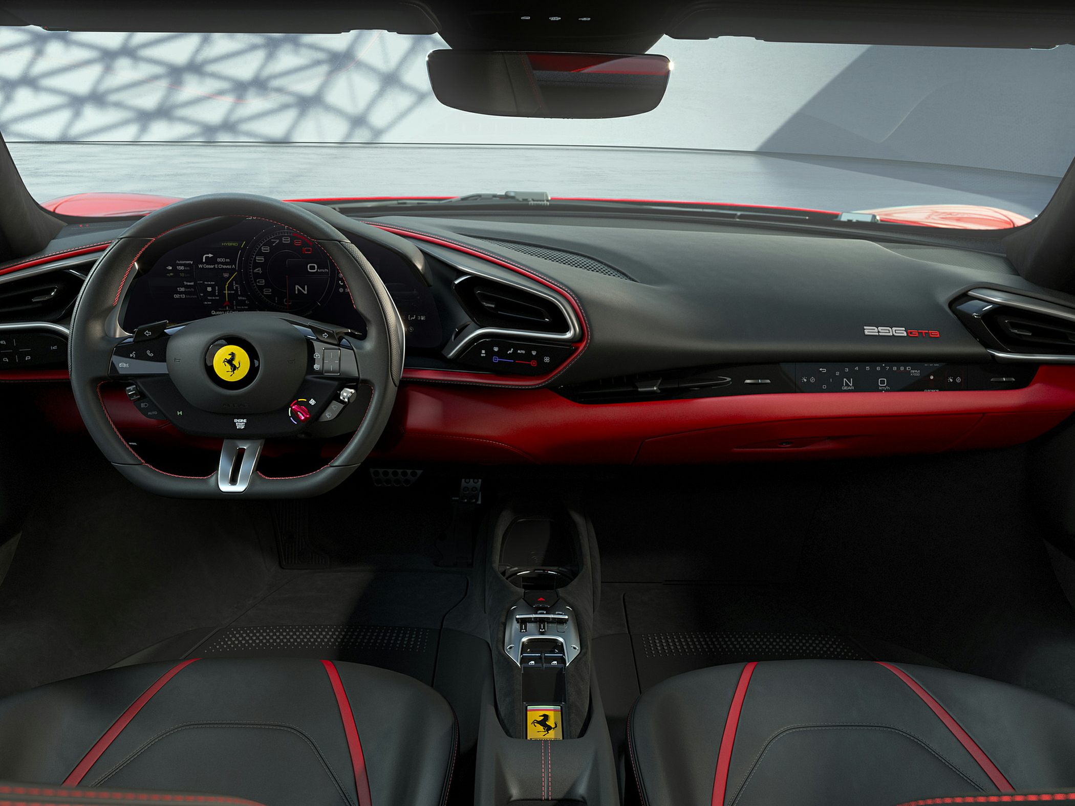 Ferrari interior with digital dashboard and sporty steering wheel
