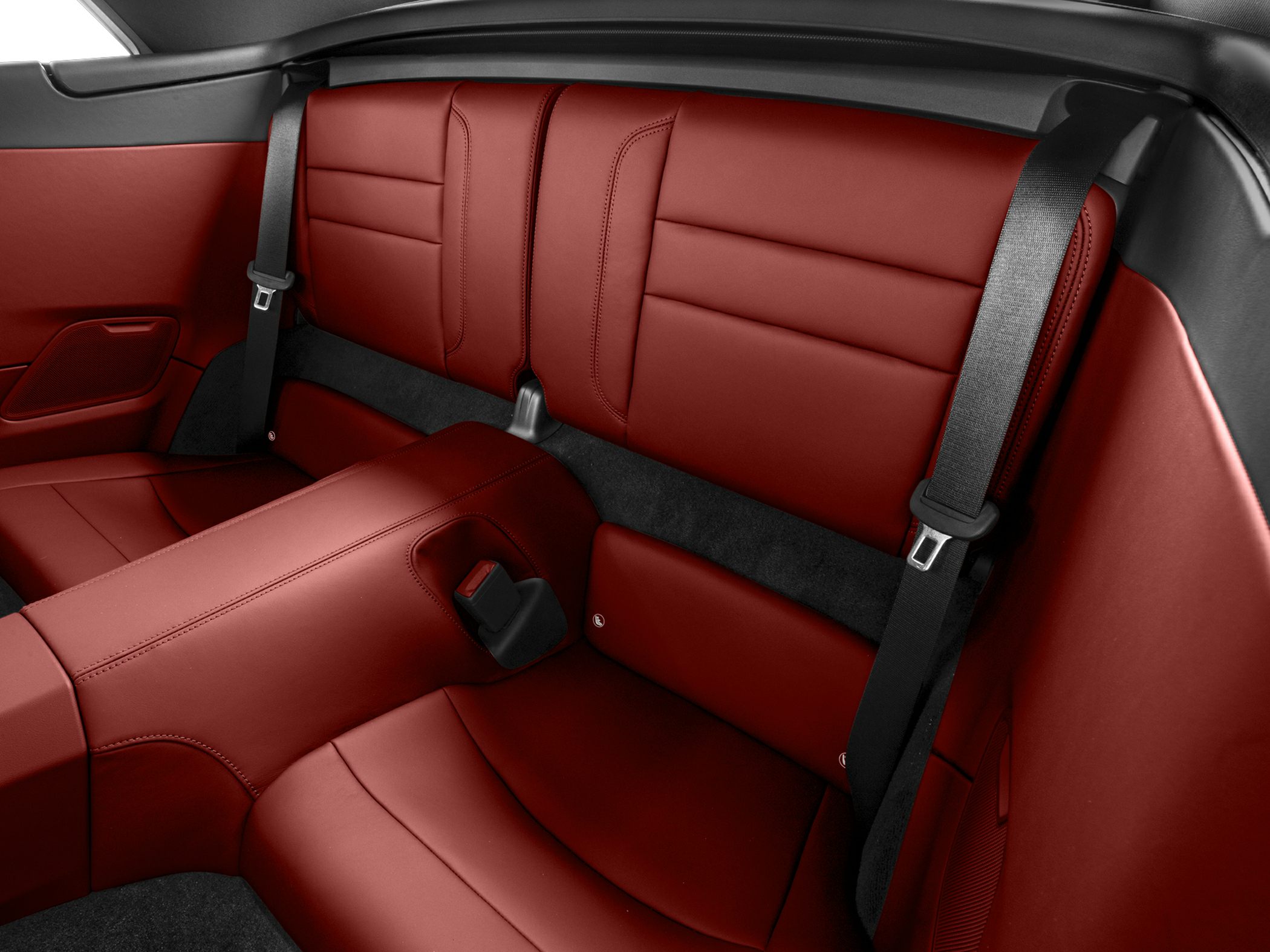 Red leather rear seats with black seat belts and center console