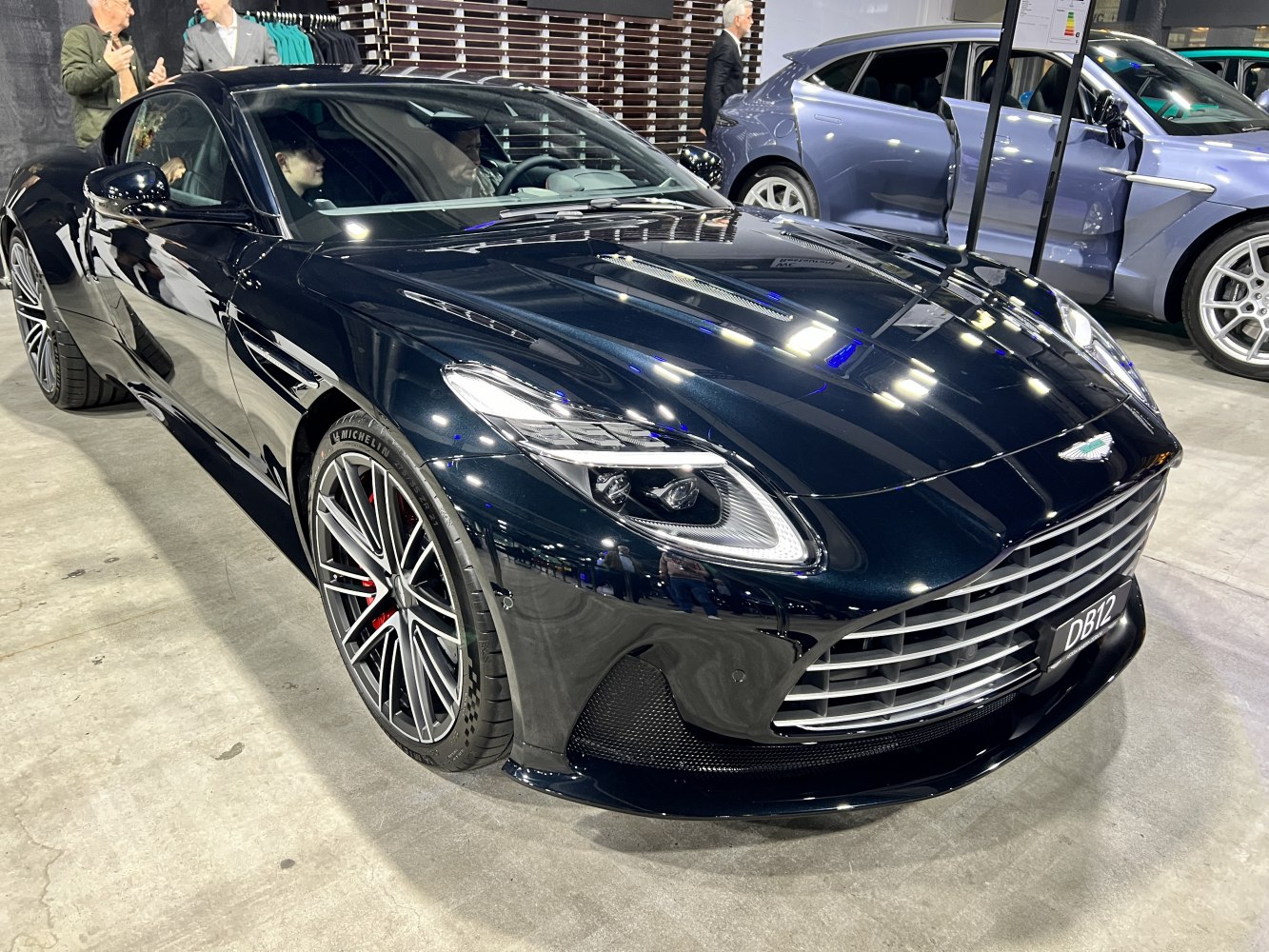Sleek front grille and sharp LED headlights of a luxury sports coupe